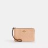 Pochette dragonne à fermeture éclair d'angle en cuir emblématique
