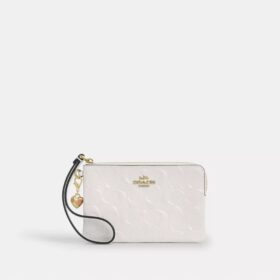 Pochette dragonne à fermeture éclair d'angle en cuir emblématique avec breloque en forme de cœur