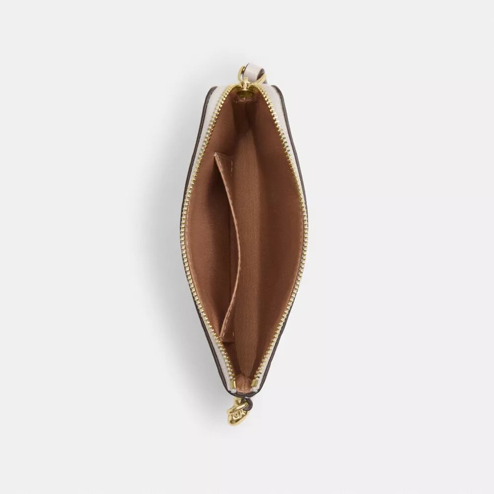 Pochette dragonne à fermeture éclair d'angle en cuir emblématique avec breloque en forme de cœur
