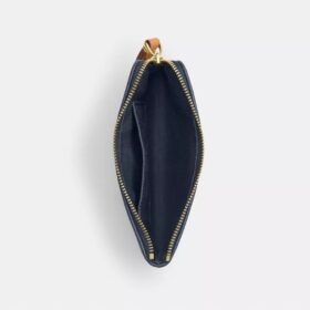 Pochette dragonne à fermeture éclair d’angle en denim emblématique