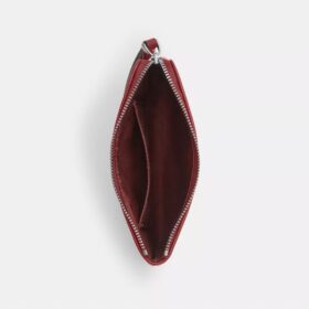 Pochette dragonne à fermeture éclair d’angle en denim emblématique