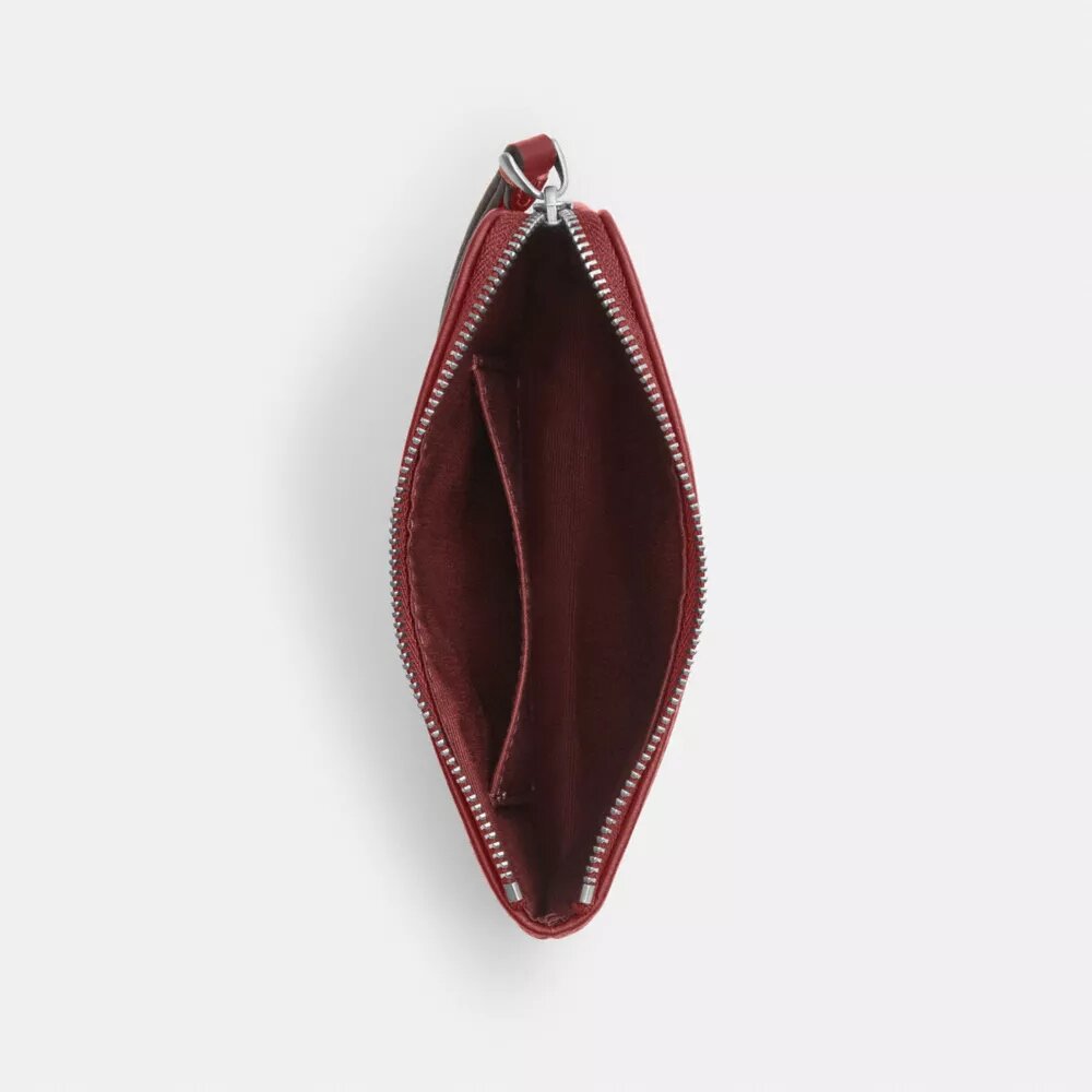 Pochette dragonne à fermeture éclair d'angle en denim emblématique