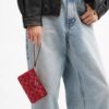 Pochette dragonne à fermeture éclair d'angle en denim emblématique