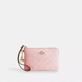 Pochette dragonne à fermeture éclair d'angle en Signature Canvas avec Charms