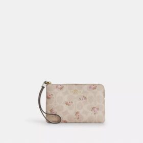 Pochette dragonne à fermeture éclair d'angle en Signature Canvas à imprimé floral