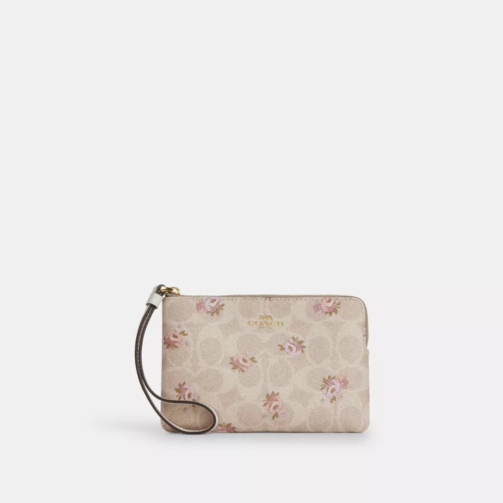 Pochette dragonne à fermeture éclair d'angle en Signature Canvas à imprimé floral
