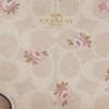 Pochette dragonne à fermeture éclair d'angle en Signature Canvas à imprimé floral