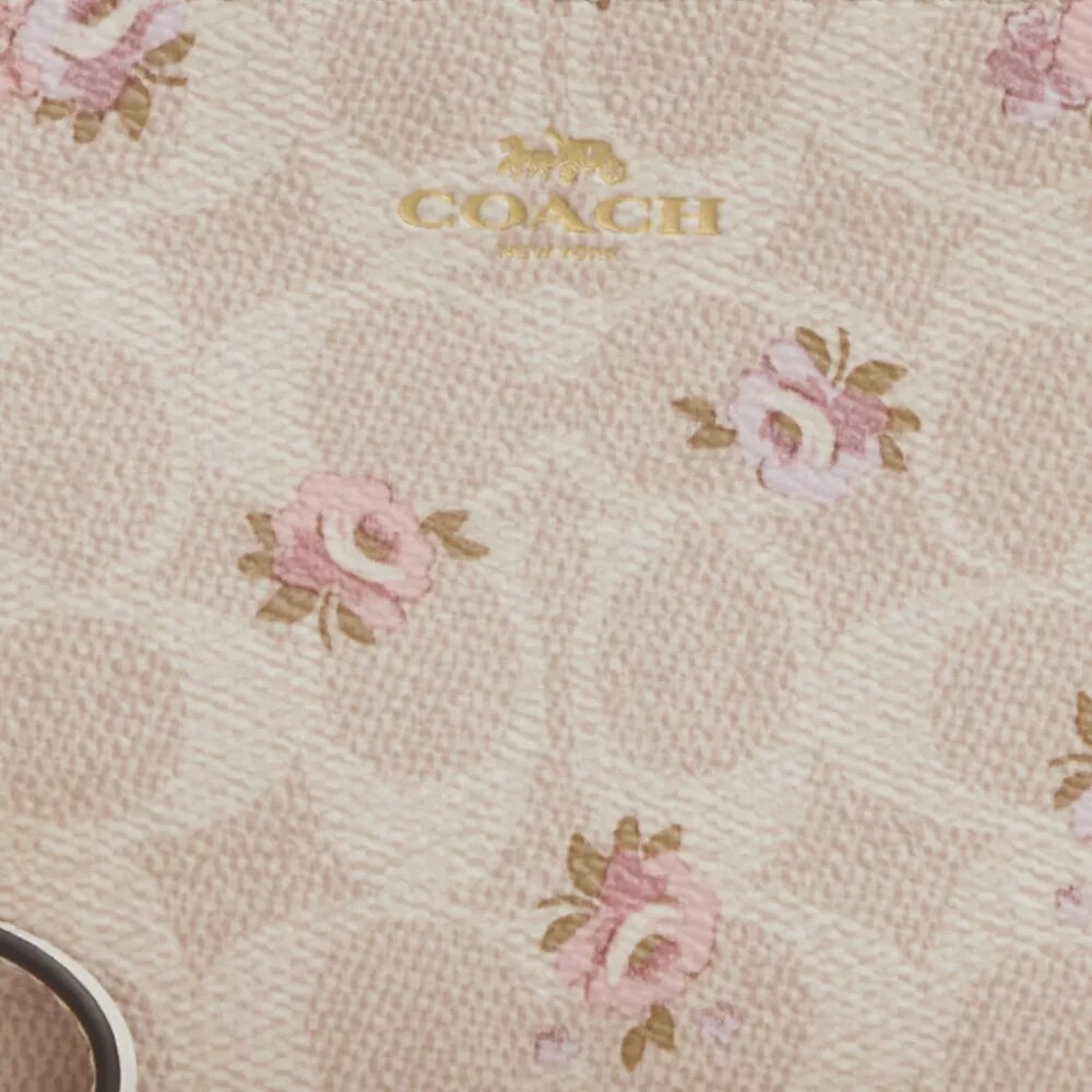Pochette dragonne à fermeture éclair d'angle en Signature Canvas à imprimé floral