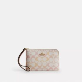 Pochette dragonne à fermeture éclair en Signature Canvas