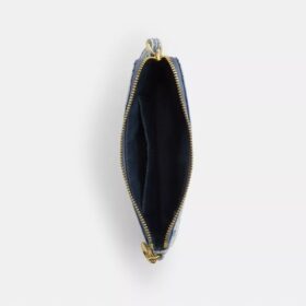 Pochette dragonne à fermeture éclair sur le côté en denim usé avec Charms