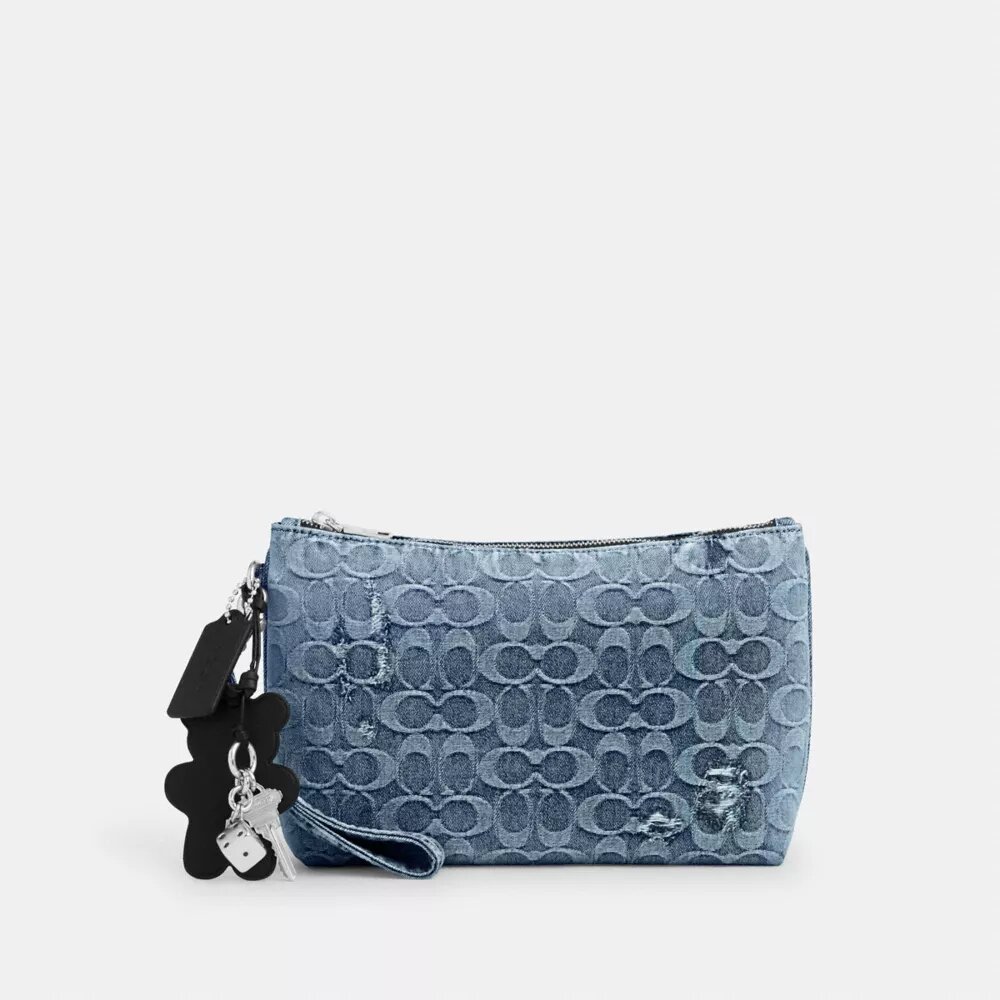 Pochette en denim emblématique « Loved » avec Charms