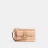 Pochettes dragonne Ashton en cuir Signature