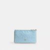 Pochettes dragonne Ashton en cuir Signature