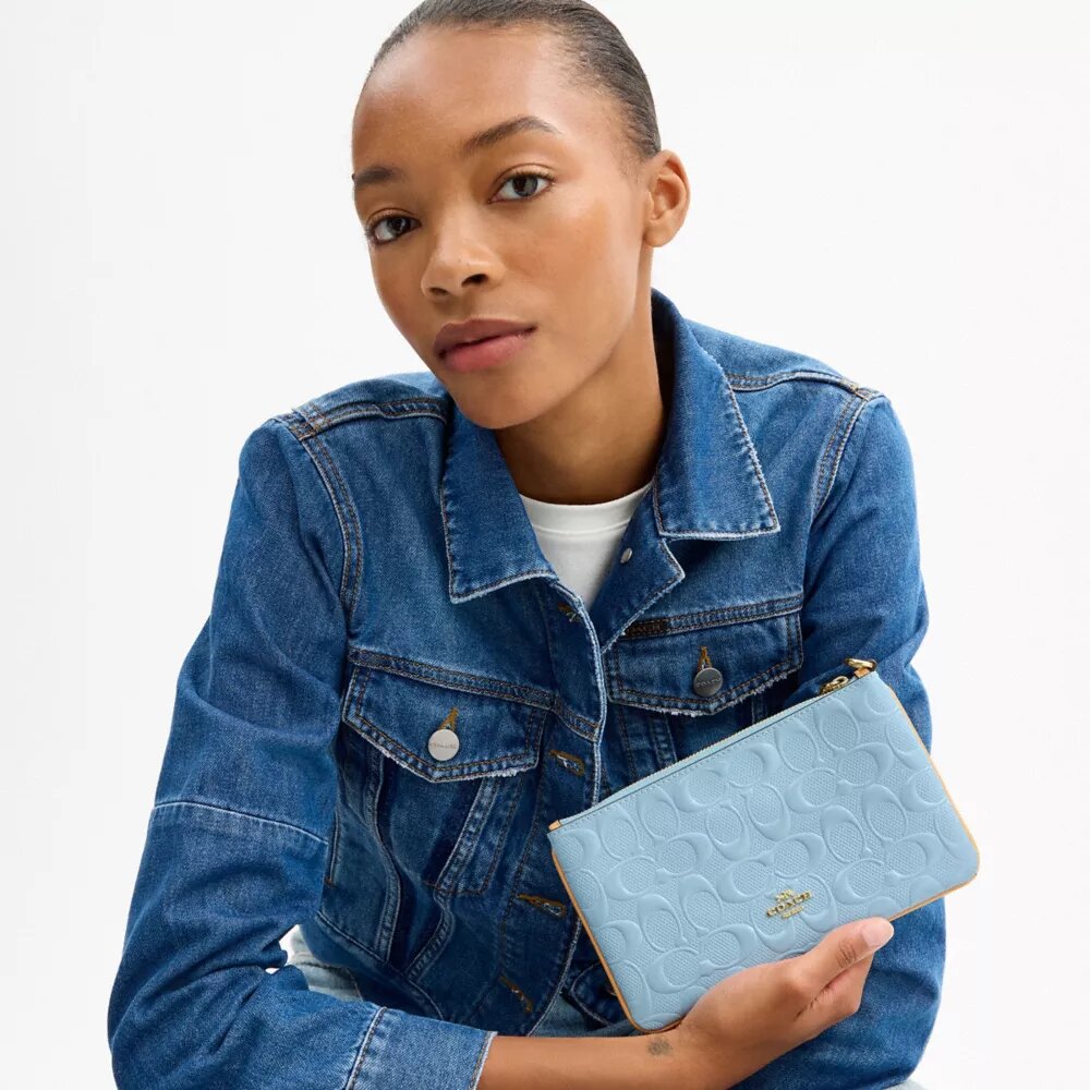 Pochettes dragonne Ashton en cuir Signature