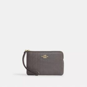 Pochettes dragonne avec fermeture à glissière dans le coin et matelassage