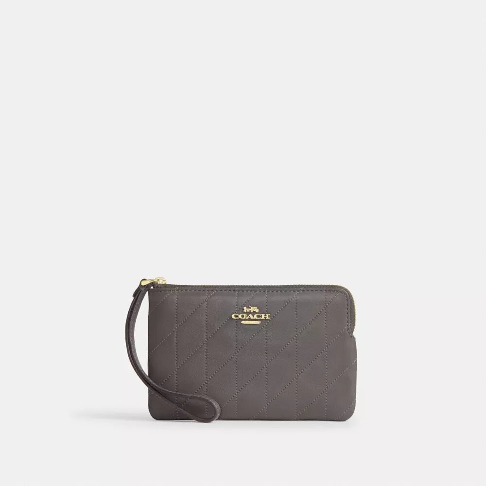 Pochettes dragonne avec fermeture à glissière dans le coin et matelassage