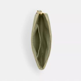 Pochettes dragonne avec fermeture à glissière dans le coin et matelassage