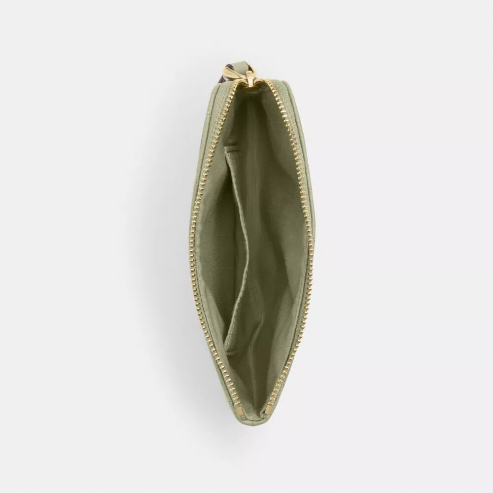 Pochettes dragonne avec fermeture à glissière dans le coin et matelassage