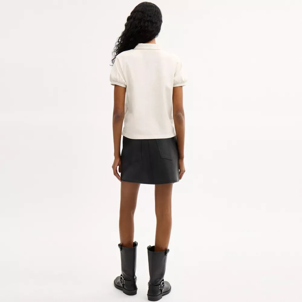 Polos ajustés Coach Script en coton biologique