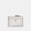 Porte-carte d'identité Mini Skinny en Signature Canvas