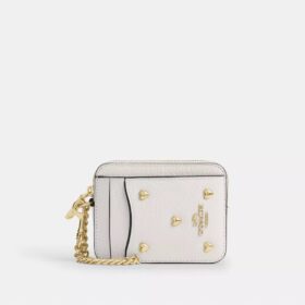 Porte-cartes à fermeture éclair avec rivets en forme de cœur