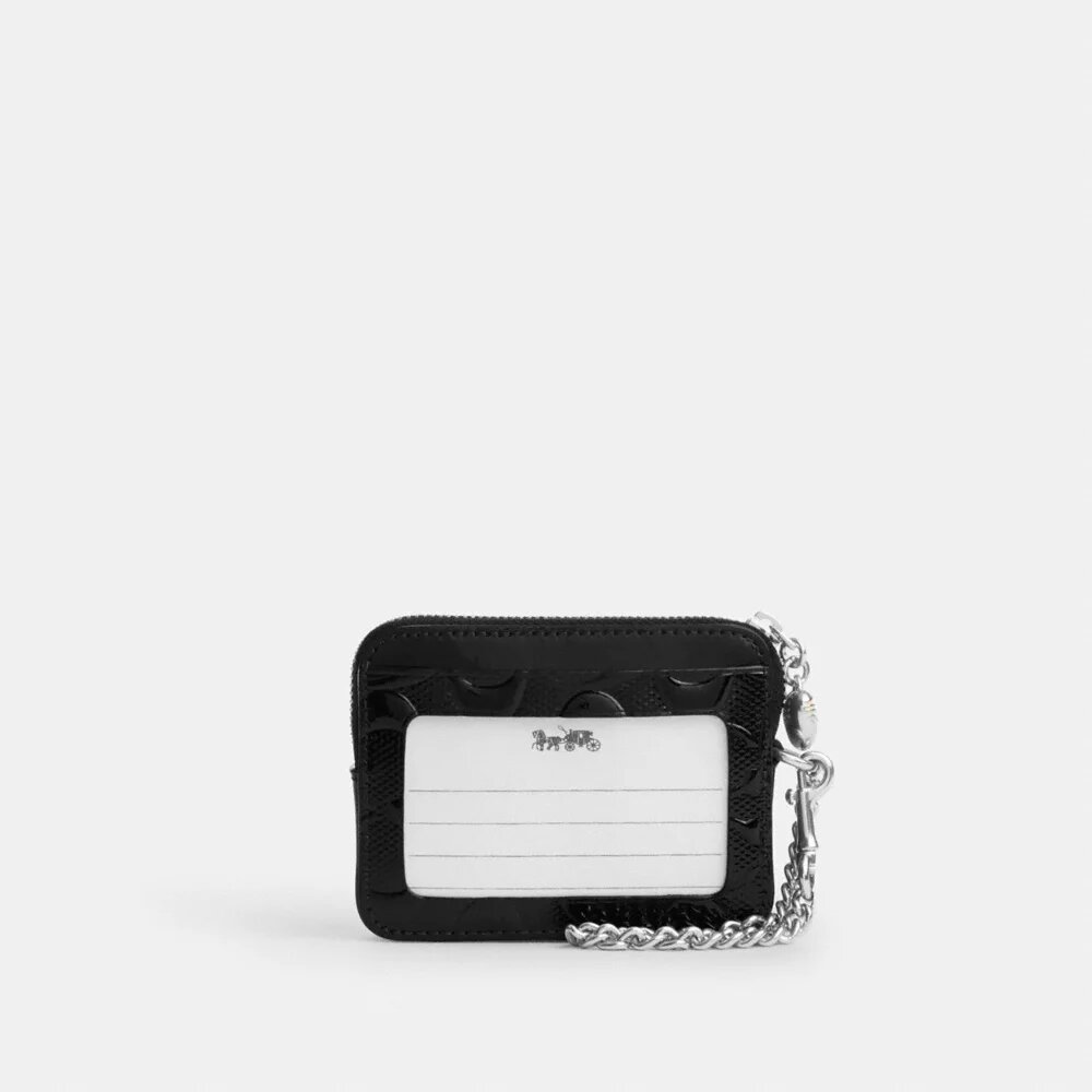 Porte-cartes à fermeture éclair en cuir emblématique avec breloque en forme de cœur
