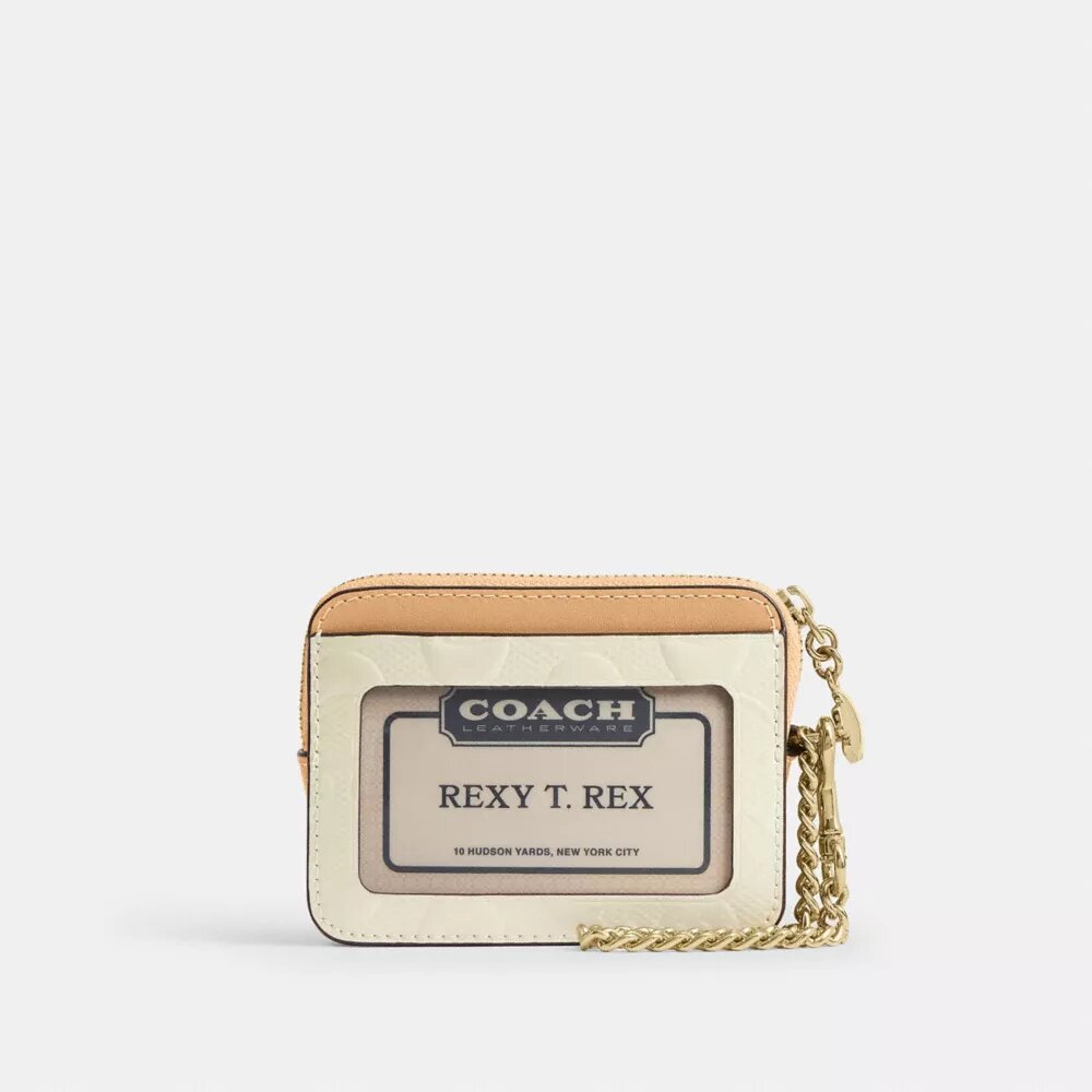 Porte-cartes à fermeture éclair en cuir signature avec Charms