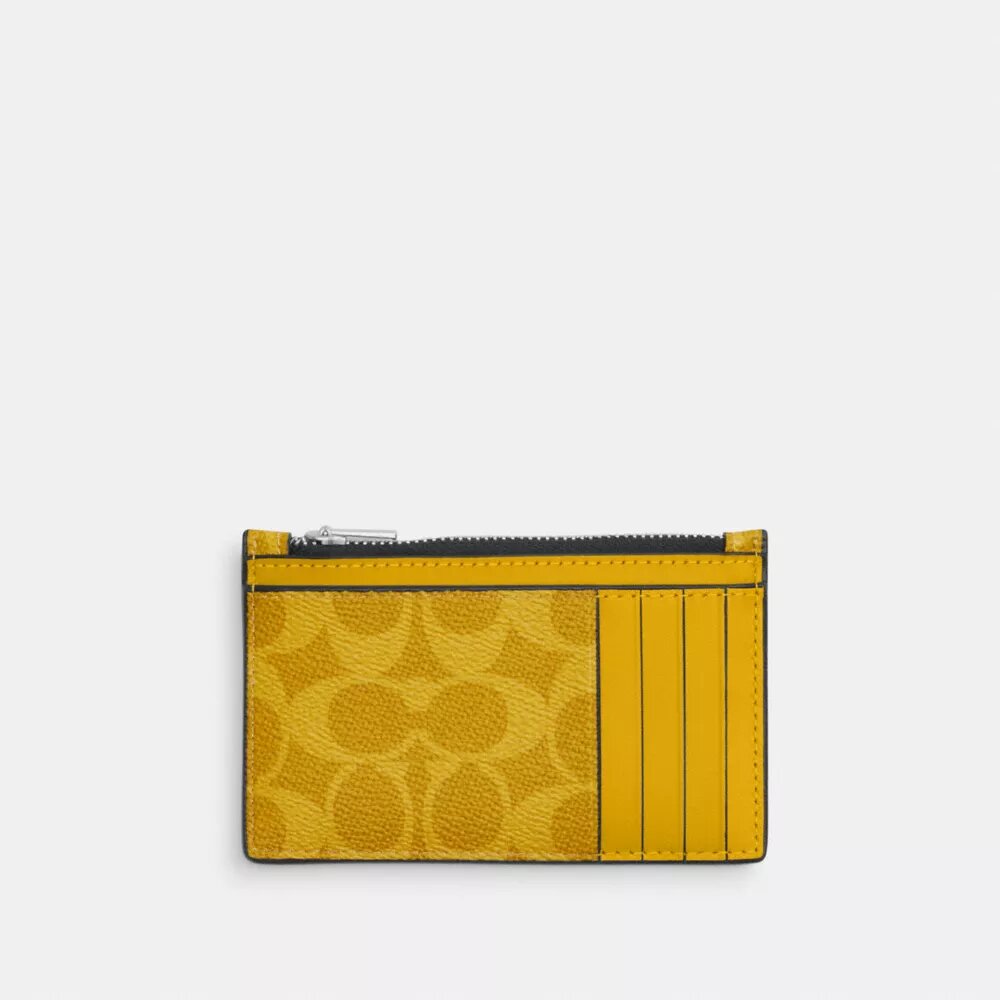 Porte-cartes à fermeture éclair en Signature Canvas