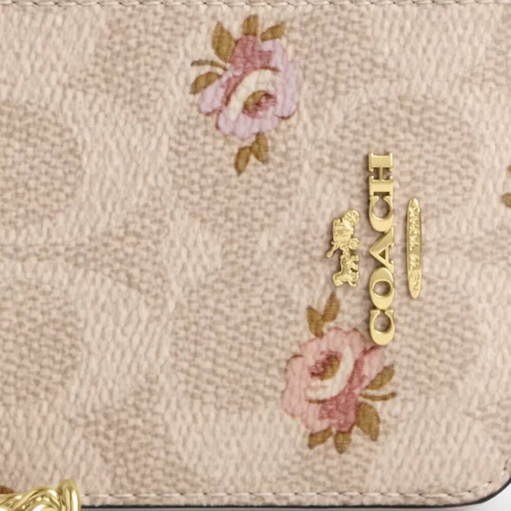 Porte-cartes à fermeture éclair en Signature Canvas à imprimé floral