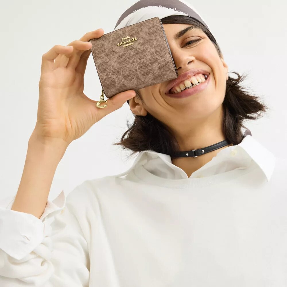 Portefeuille à bouton-pression en Signature Canvas