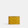Portefeuille compact en Signature Canvas