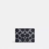 Portefeuille compact en Signature Canvas