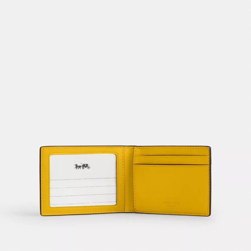 Portefeuille compact en Signature Canvas