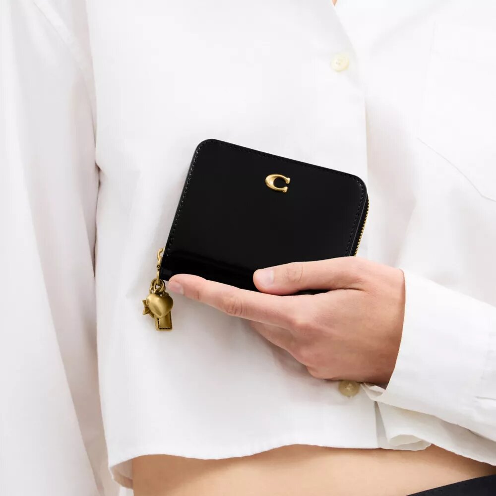 Portefeuille essentiel avec Charms