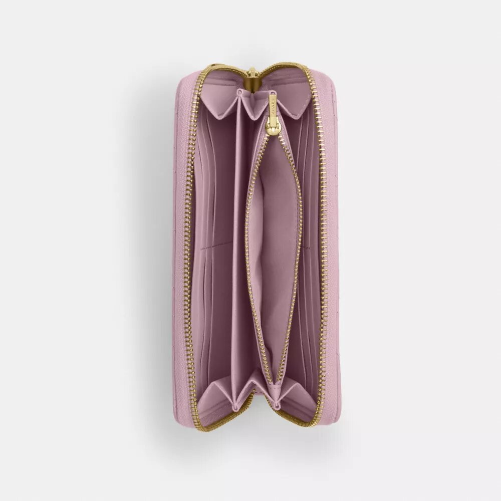 Portefeuille long à fermeture éclair sur tout le pourtour avec matelassage