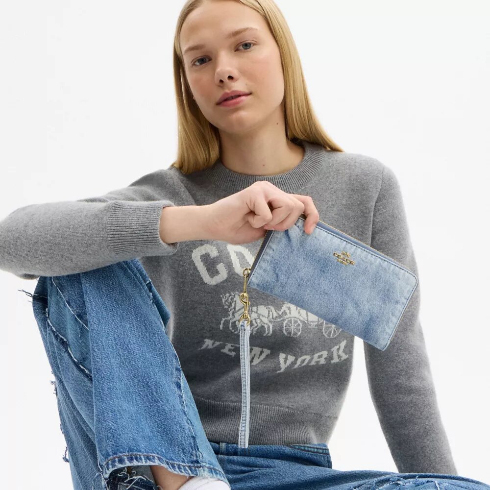 Portefeuille long à fermeture éclair sur tout le pourtour en denim « Loved »