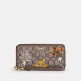 Portefeuille long à fermeture éclair sur tout le pourtour en jacquard Signature avec broderie florale