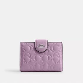 Portefeuille moyen à fermeture éclair d'angle en cuir emblématique