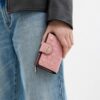 Portefeuille moyen à fermeture éclair d'angle en cuir emblématique