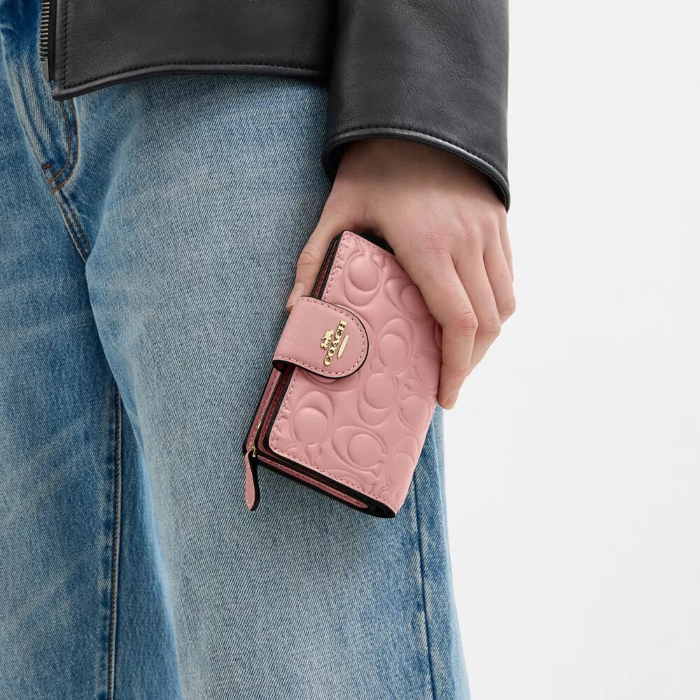 Portefeuille moyen à fermeture éclair d'angle en cuir emblématique