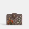 Portefeuille moyen à fermeture éclair en jacquard emblématique avec broderie florale