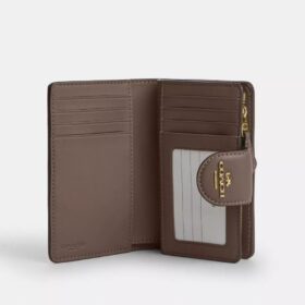 Portefeuille moyen à fermeture éclair en jacquard emblématique avec broderie florale