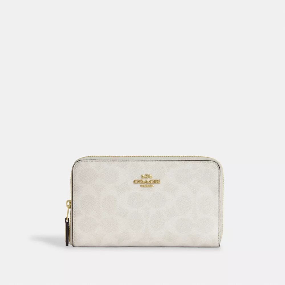 Portefeuille zippé moyen en Signature Canvas