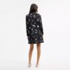 Robe à étoiles et col noué