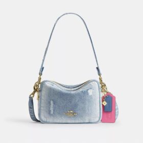 Sac à bandoulière Carey en denim « Loved » avec Charms