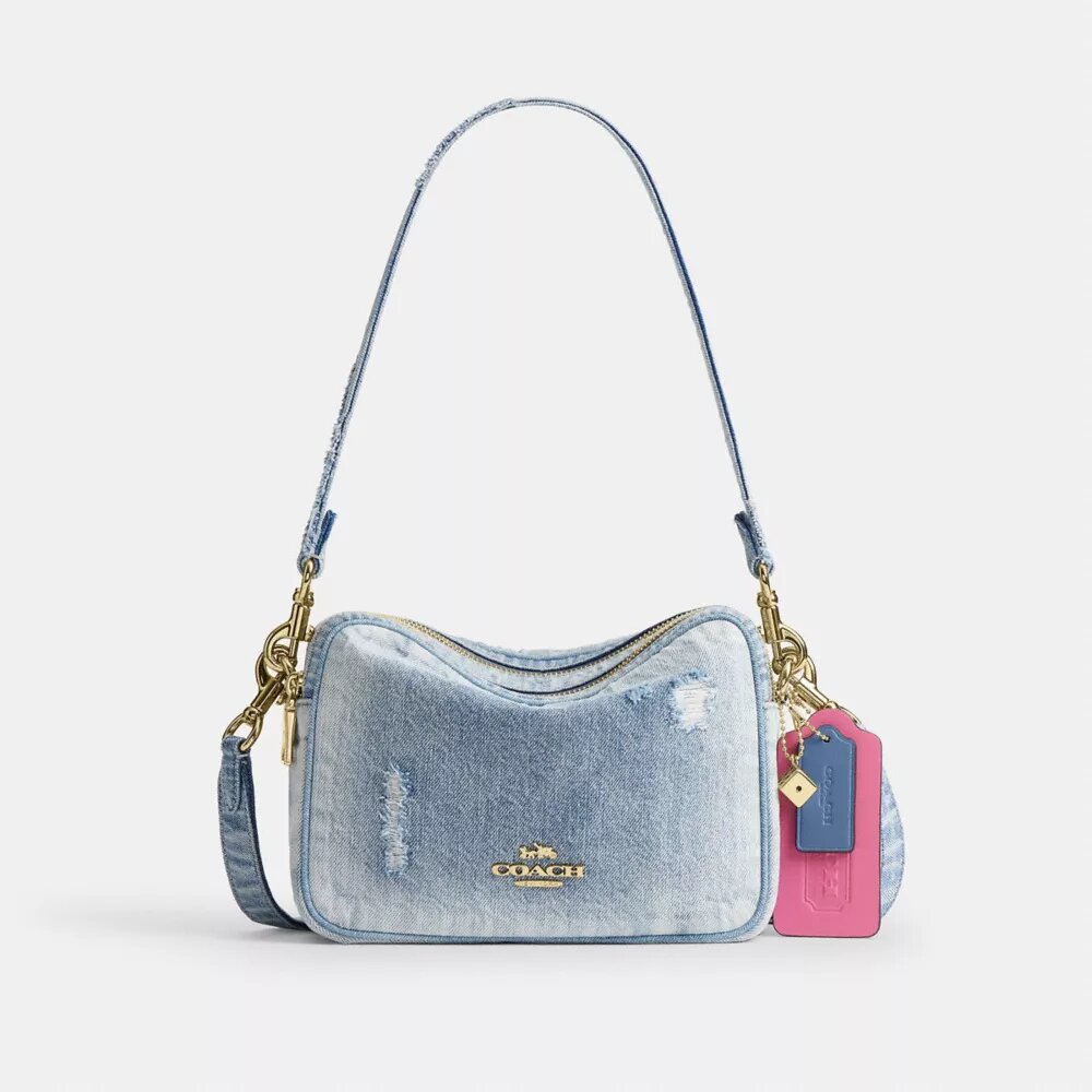 Sac à bandoulière Carey en denim « Loved » avec Charms