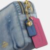 Sac à bandoulière Carey en denim « Loved » avec Charms
