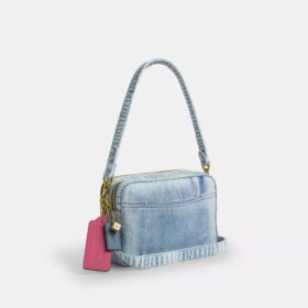 Sac à bandoulière Carey en denim « Loved » avec Charms