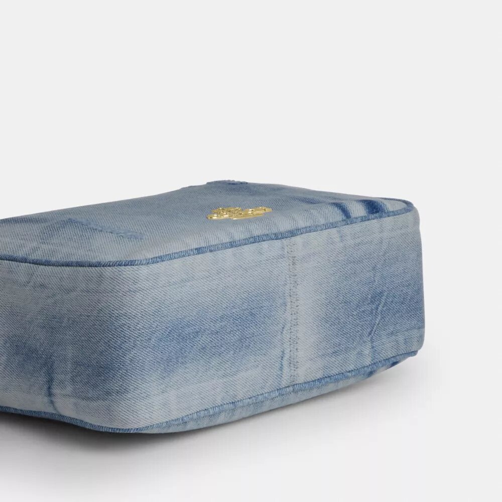 Sac à bandoulière Carey en denim « Loved » avec Charms
