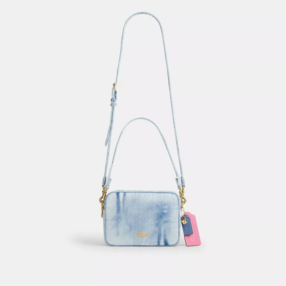 Sac à bandoulière Carey en denim « Loved » avec Charms